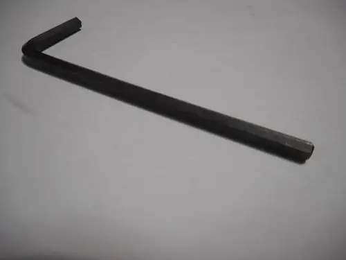 Schwarzer 6-Kant Schlüssel mit L-Form, geeignet für verschiedene Anwendungen, möglicherweise von der Marke Remeha. Klar strukturiert und funktional.